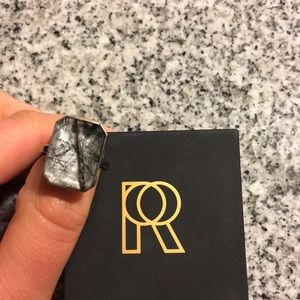 Ringly fitness tracking ring in charging box